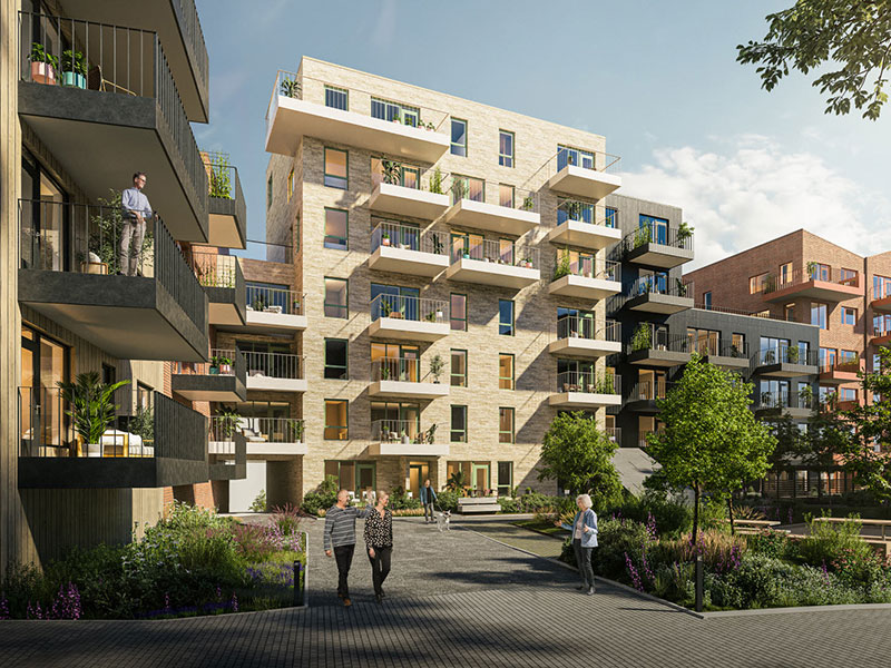 Fasadebilde fra boligprosjektet Skårerløkka på Lørenskog. Mann står på balkong og nyter en flott solnedgang.