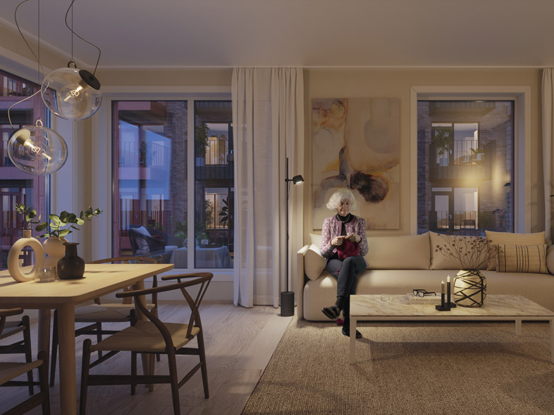 3D-tegning som viser boligprosjektet Wessel Park i Vestby fra Rådhusgata. Lyse brune murfliser på bygget og grønne trer i gatene utenfor.