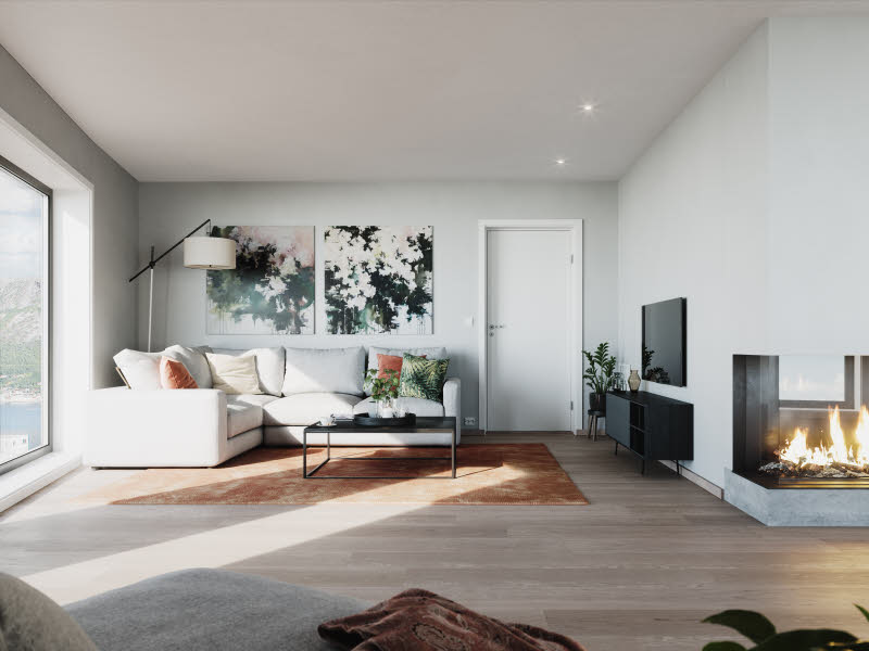 To personer som sitter på gulvet og ser seg rundt i et rom. 